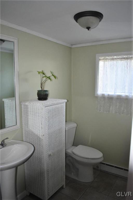 567 Cherry Hill Road Nazareth, PA 18064 - Photo 7 of 14 a bathroom with a toilet a sink and mirror
