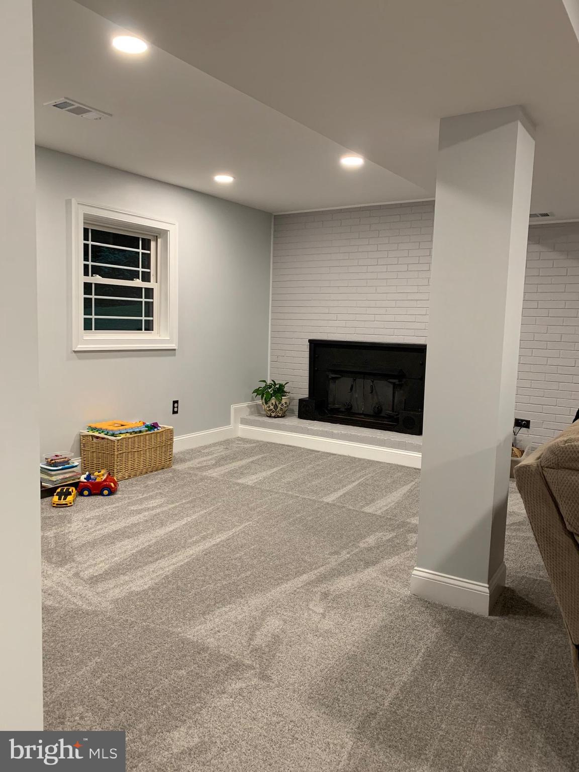 8003 Ronald Road Manassas, VA 20112 - Photo 24 of 47 Basement (Fireplace w/Wood Burning Stove)