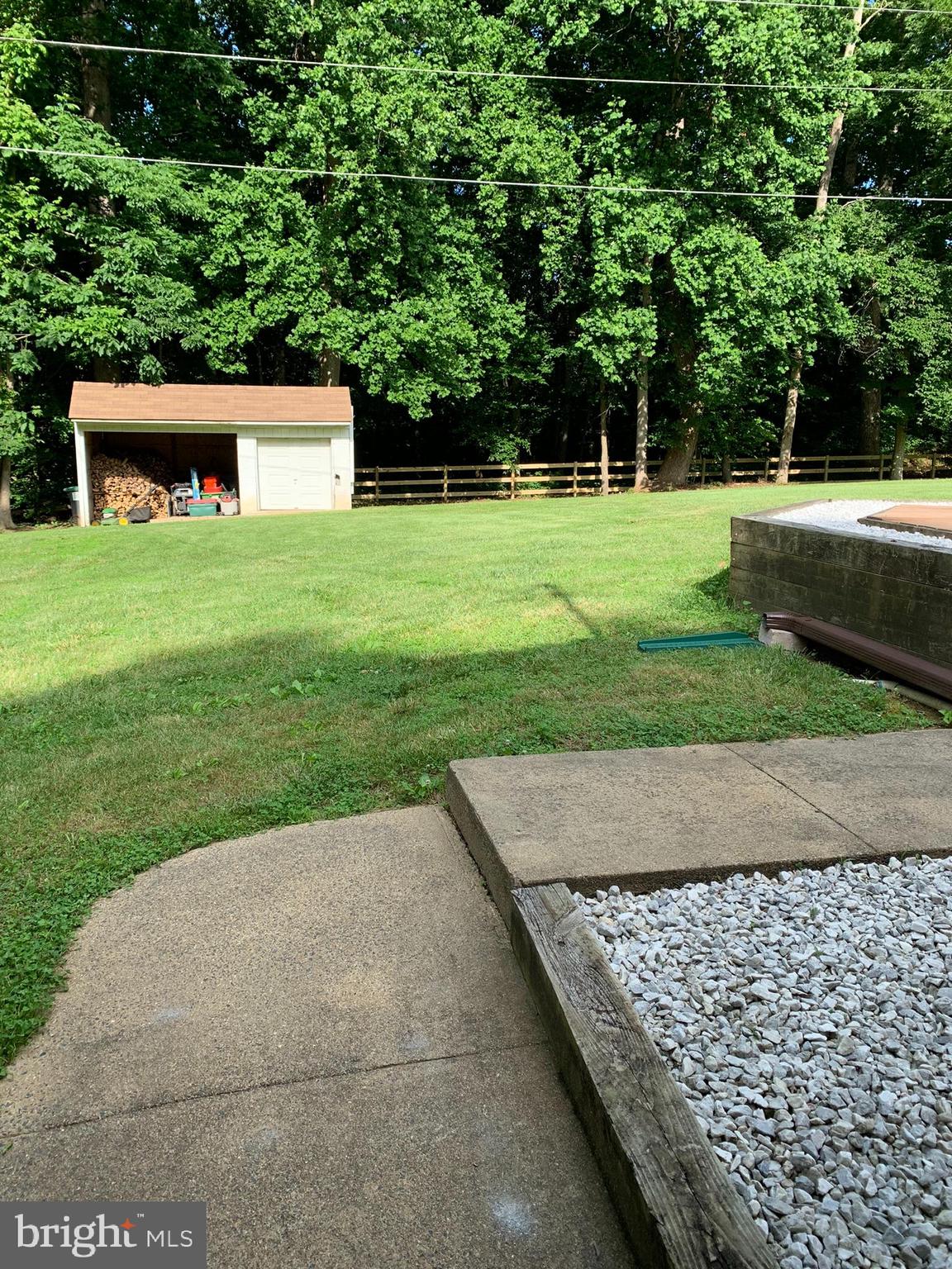 8003 Ronald Road Manassas, VA 20112 - Photo 46 of 47 Back Yard View From Garage