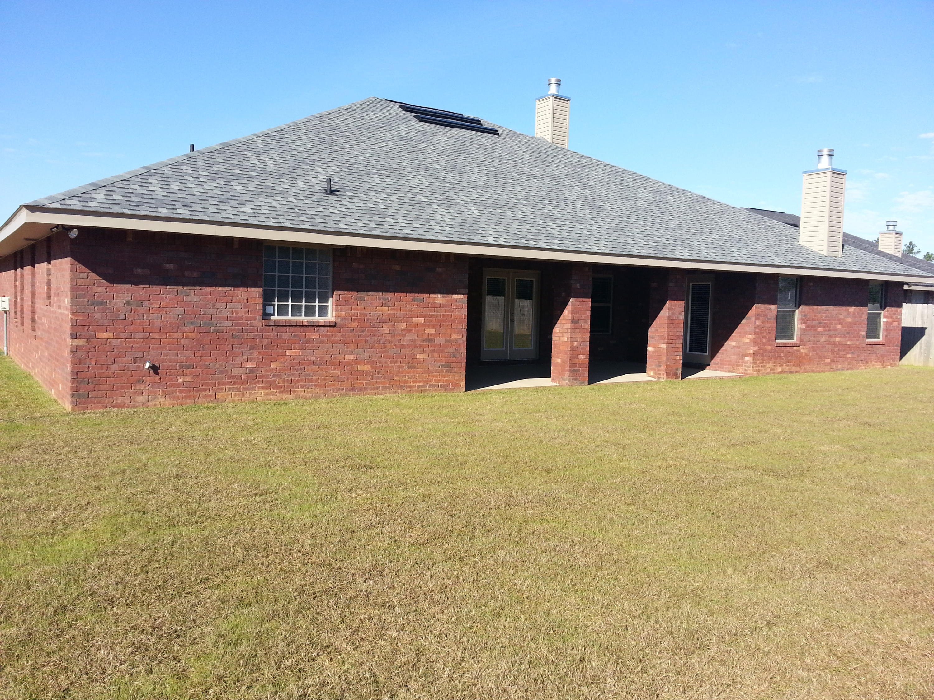5744 Marigold Loop Crestview, FL 32539 - Photo 2 of 4 a view of outdoor space and front view of a house