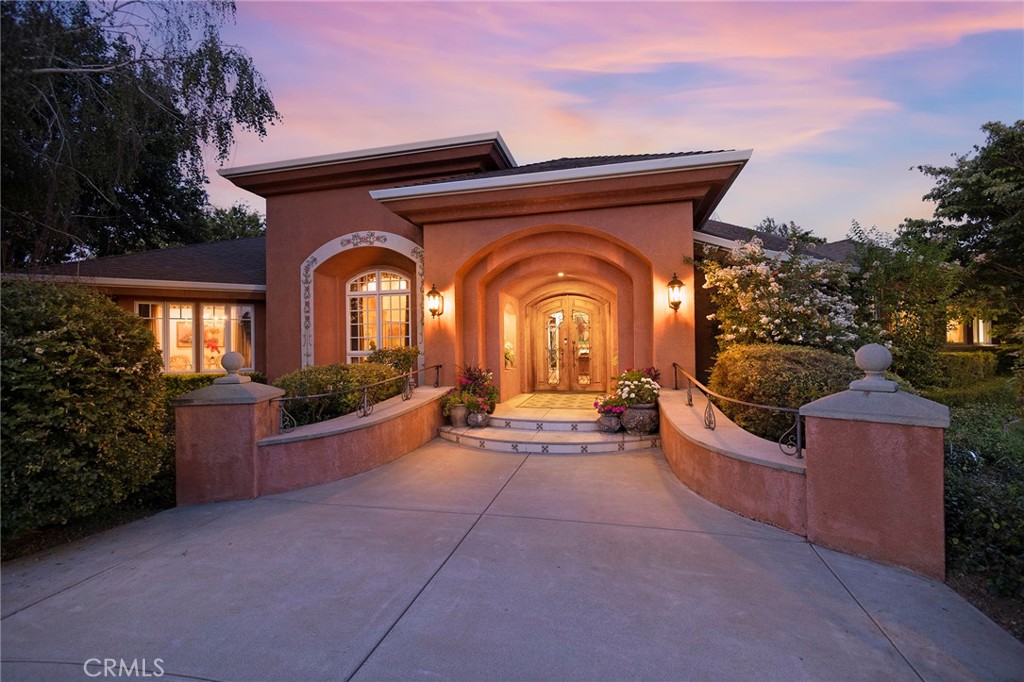 369 Marmore Road Chico, CA 95928 - Photo 2 of 62 a view of a couches and a fire pit in the backyard of the house