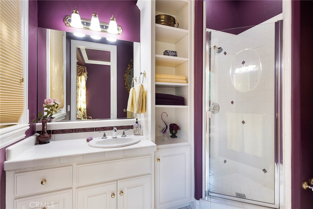 369 Marmore Road Chico, CA 95928 - Photo 45 of 62 a bathroom with a double vanity sink and a mirror