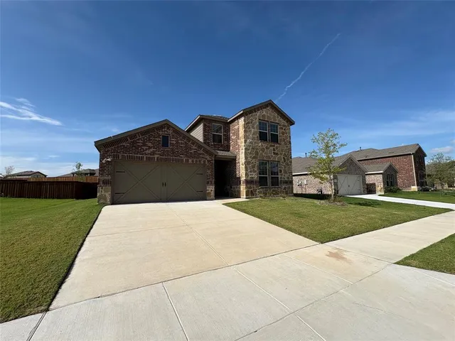 a swimming pool with outdoor seating and yard