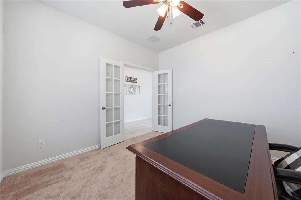4542 Kipling Avenue Aubrey, TX 76227 - Photo 4 of 34 an empty room with closet
