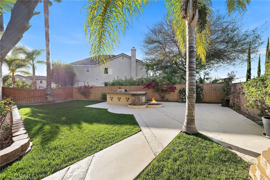 44840 Tudal Street Temecula, CA 92592 - Photo 24 of 35 a front view of a house with garden
