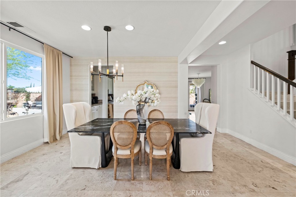 44840 Tudal Street Temecula, CA 92592 - Photo 6 of 35 a dining room with furniture a chandelier and window
