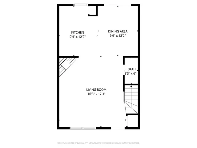 a picture of a bench in front of a wall