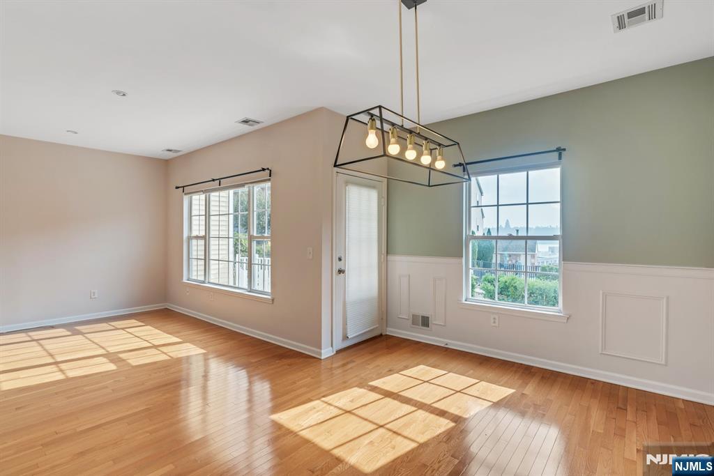 66 Bergen Ridge Road, Unit 1 North Bergen, NJ 07047 - Photo 11 of 26 a view of an empty room with wooden floor and a window