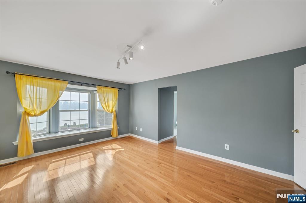 66 Bergen Ridge Road, Unit 1 North Bergen, NJ 07047 - Photo 15 of 26 a view of an empty room with a window
