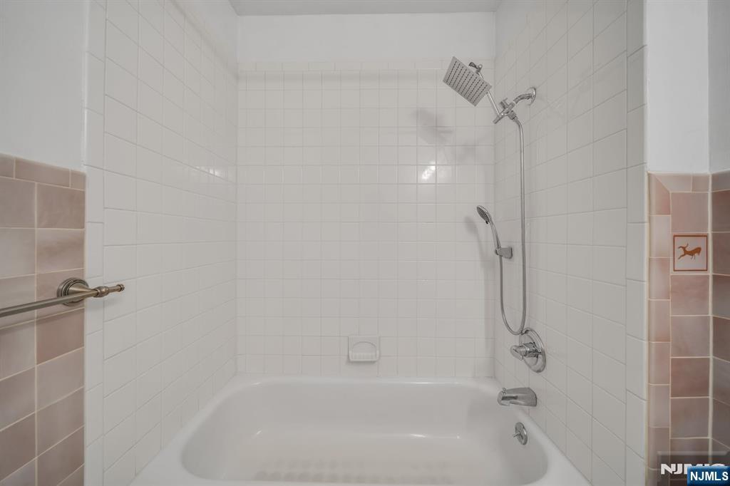 66 Bergen Ridge Road, Unit 1 North Bergen, NJ 07047 - Photo 21 of 26 a close view of a bathtub in bathroom