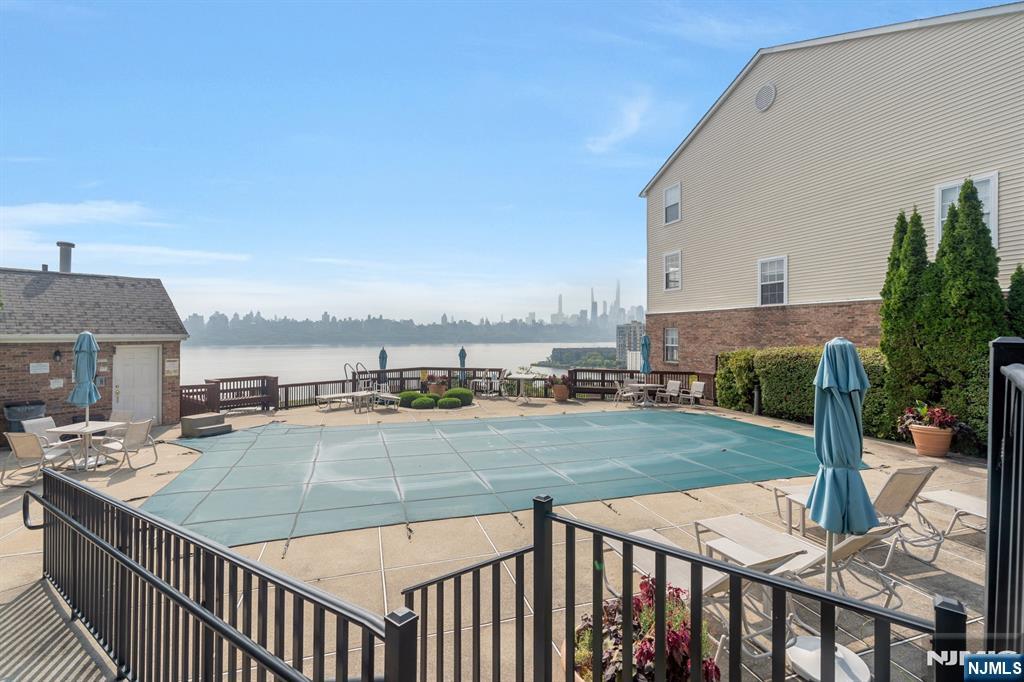 66 Bergen Ridge Road, Unit 1 North Bergen, NJ 07047 - Photo 26 of 26 a view of a patio with a table and chairs
