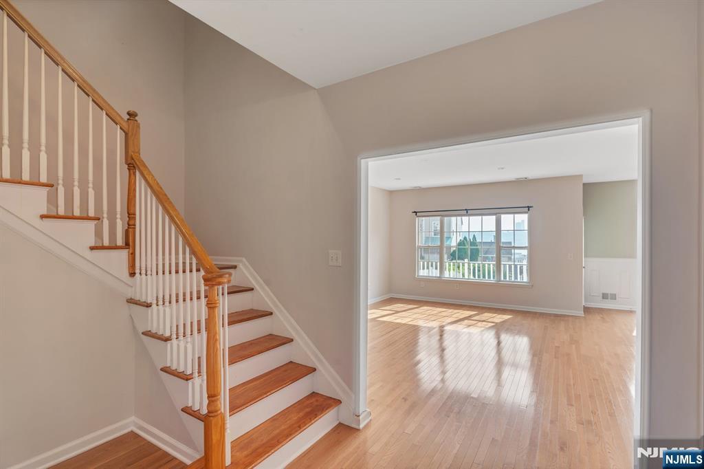 66 Bergen Ridge Road, Unit 1 North Bergen, NJ 07047 - Photo 7 of 26 a view of an entryway with wooden floor