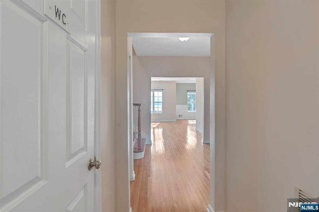66 Bergen Ridge Road, Unit 1 North Bergen, NJ 07047 - Photo 8 of 26 a view of a bathroom from a hallway
