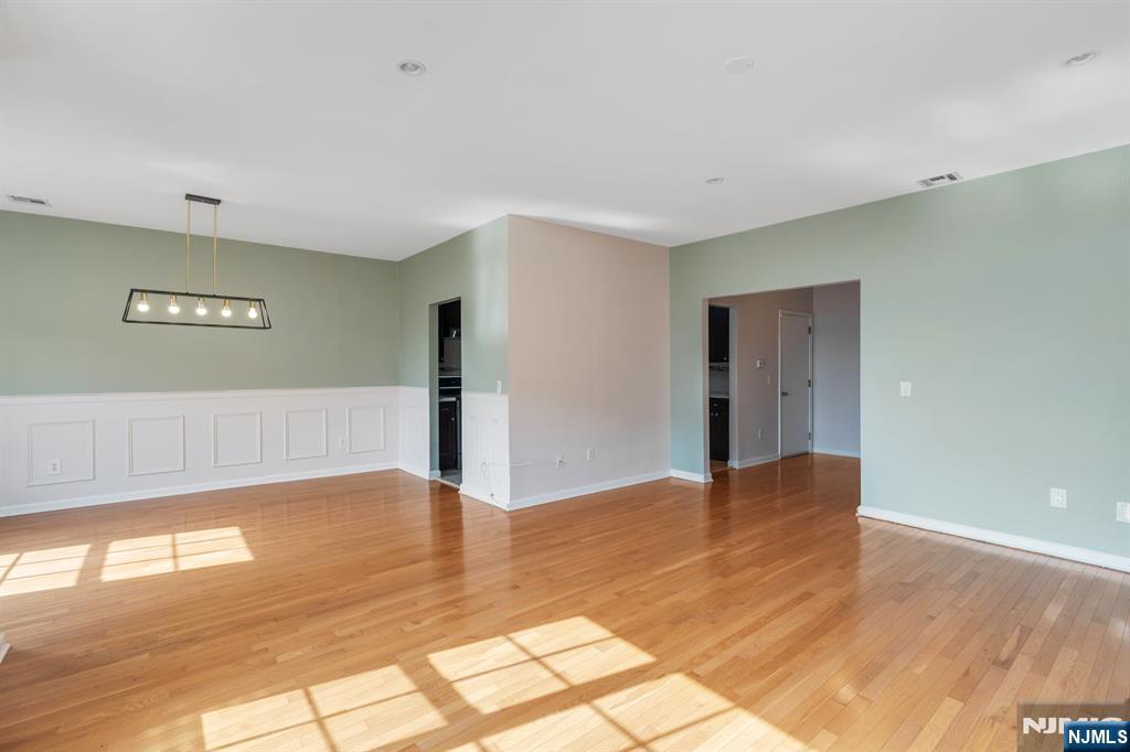 66 Bergen Ridge Road, Unit 1 North Bergen, NJ 07047 - Photo 9 of 26 a view of empty room with wooden floor