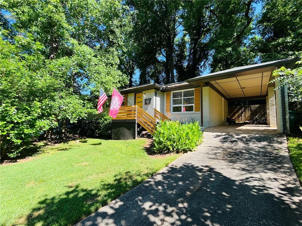 2992 Pasadena Drive Decatur, GA 30032 - Photo 1 of 1 a front view of a house with a yard