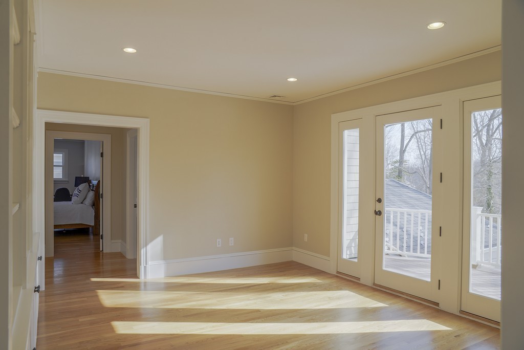 16 Winthrop Road Lexington, MA 02421 - Photo 18 of 29 a view of empty room with wooden floor and fan