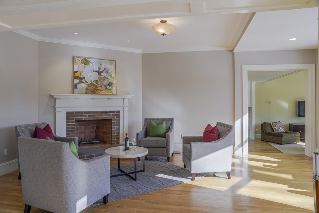 16 Winthrop Road Lexington, MA 02421 - Photo 6 of 29 a living room with furniture and a fireplace