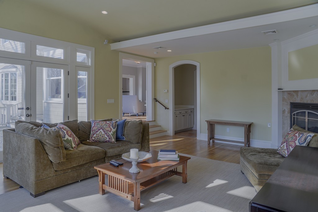 16 Winthrop Road Lexington, MA 02421 - Photo 8 of 29 a living room with furniture and a fireplace