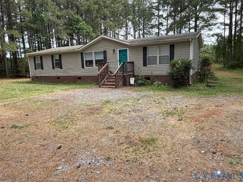 26049 Guy Place Road Courtland, VA 23837 - Photo 1 of 1 Single-story residence featuring light-colored sid