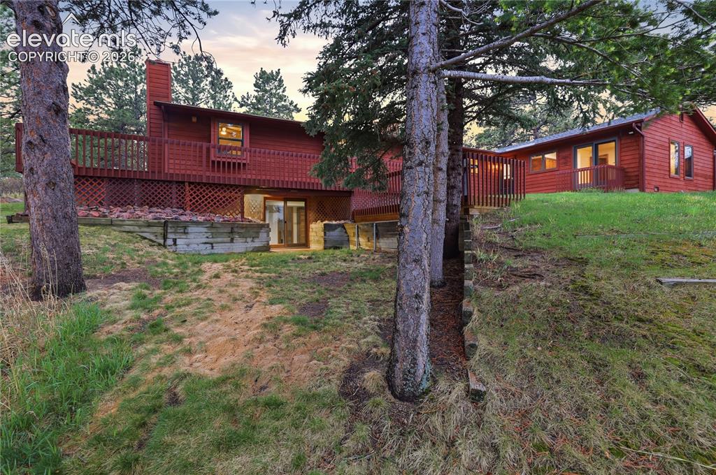 18190 Forest View Road Monument, CO 80132 - Photo 45 of 50 a house view with a backyard space