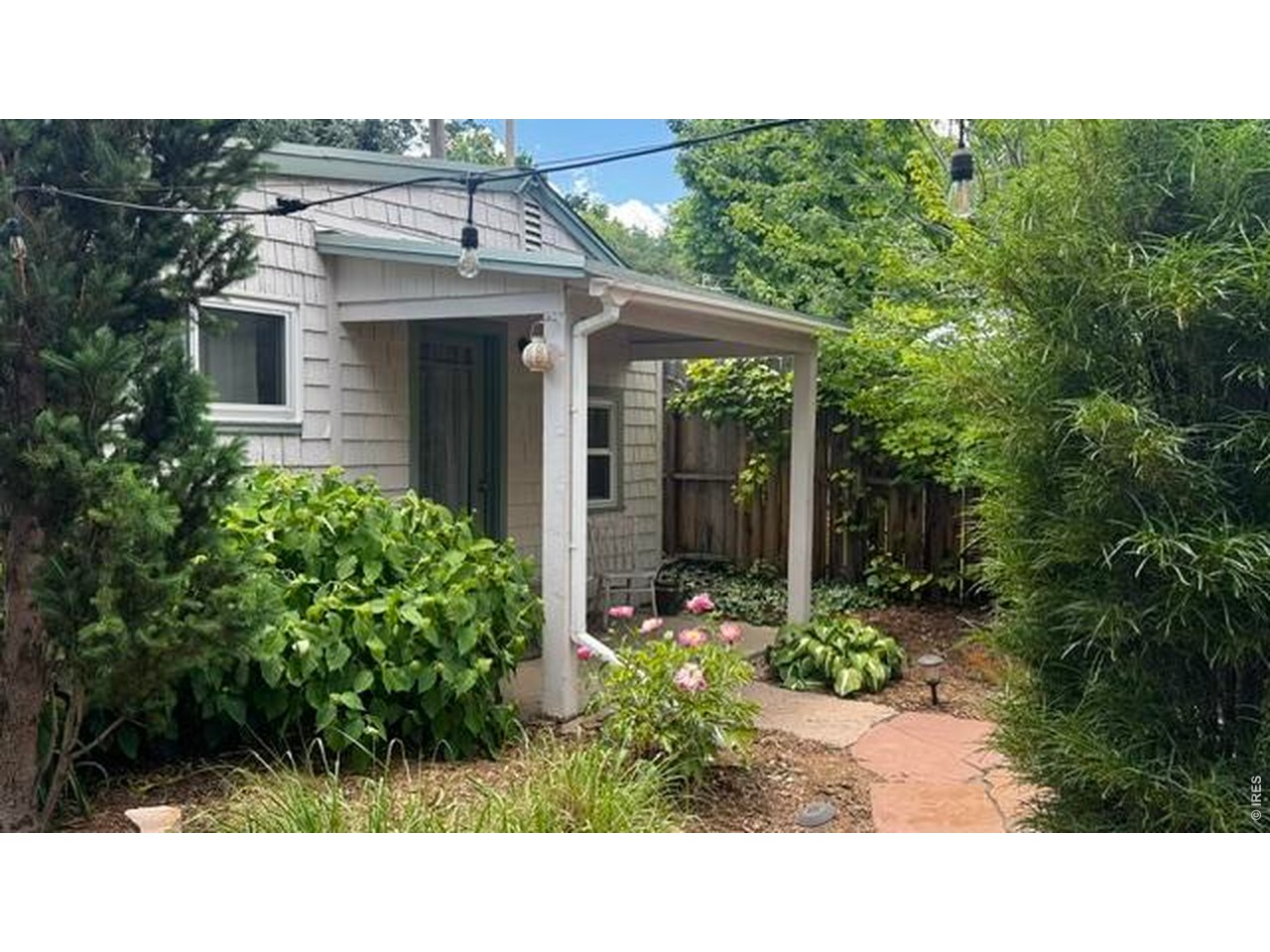 1020 Portland Place Boulder, CO 80304 - Photo 25 of 43 Cottage entrance when it's lush and green