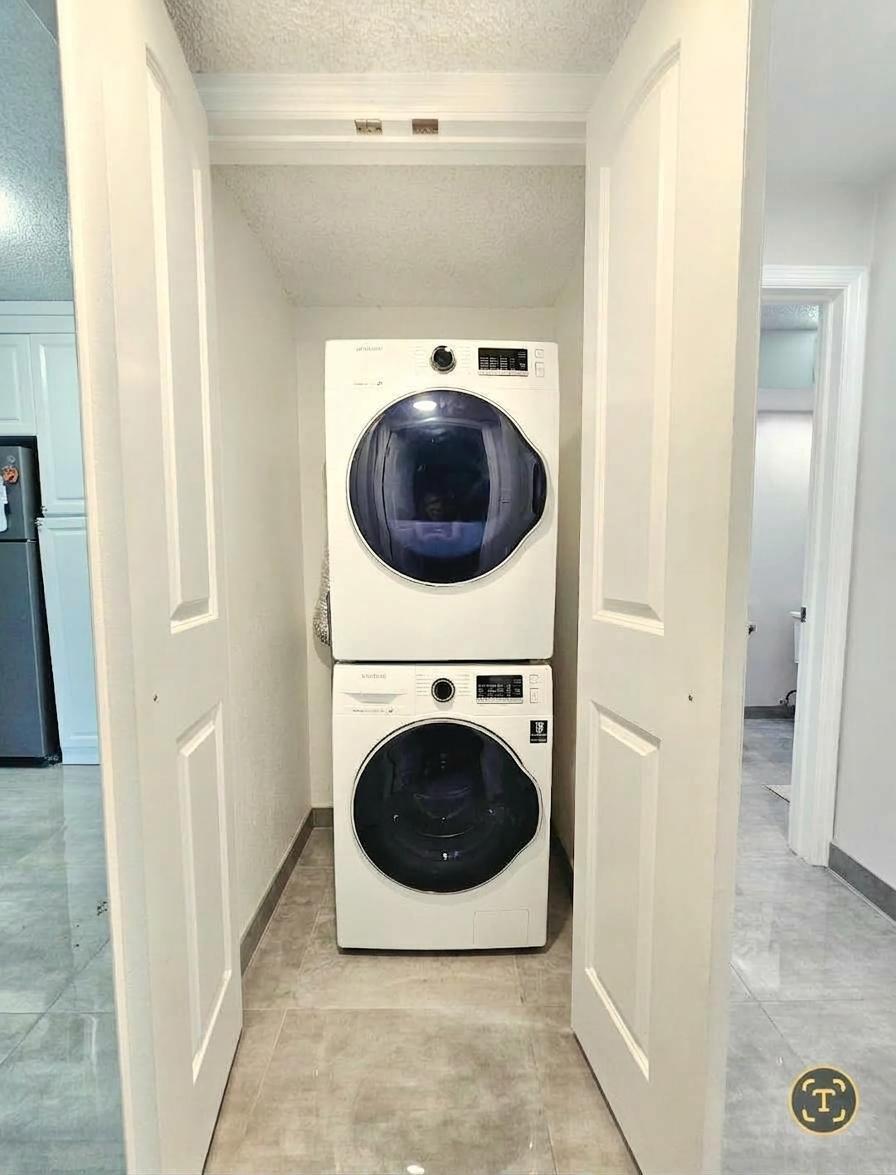 651 Lyons Road, Unit 10107 Coconut Creek, FL 33063 - Photo 5 of 23 WASHER & DRYER