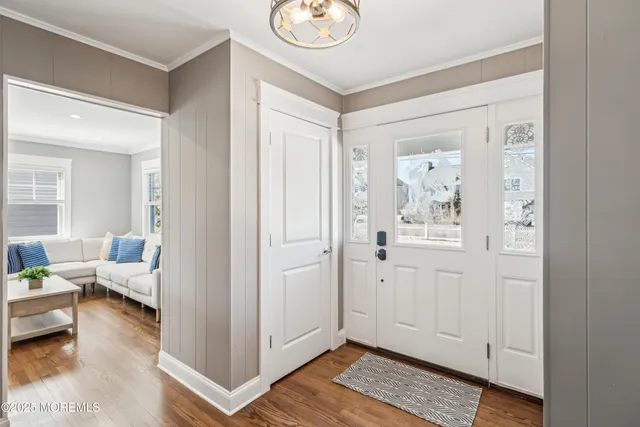 a view of a livingroom with furniture and wooden floor