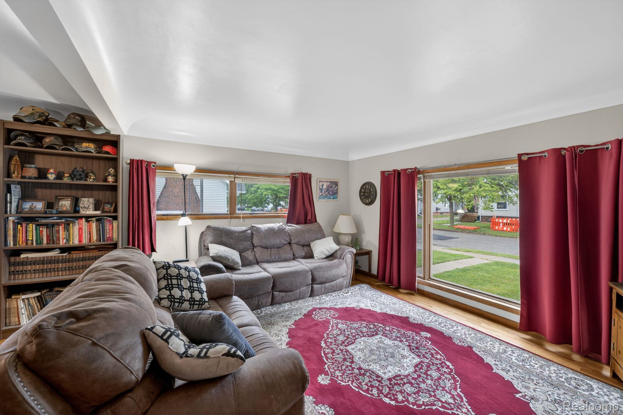 304 West Ridge Street Owosso, MI 48867 - Photo 7 of 45 Living room featuring wood finished floors and healthy amount of natural light