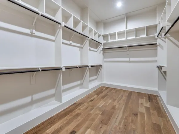 a view of an empty walk in closet