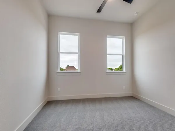 an empty room with windows