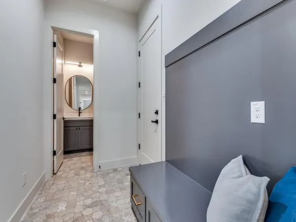 a view of a livingroom with furniture and front door