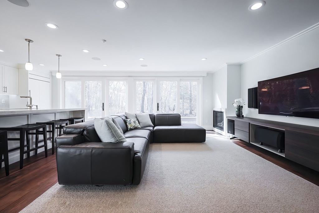 41 Gilbert Road Needham, MA 02492 - Photo 1 of 40 a living room with furniture and a flat screen tv