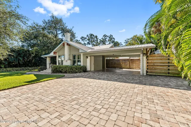 a front view of a house with yard
