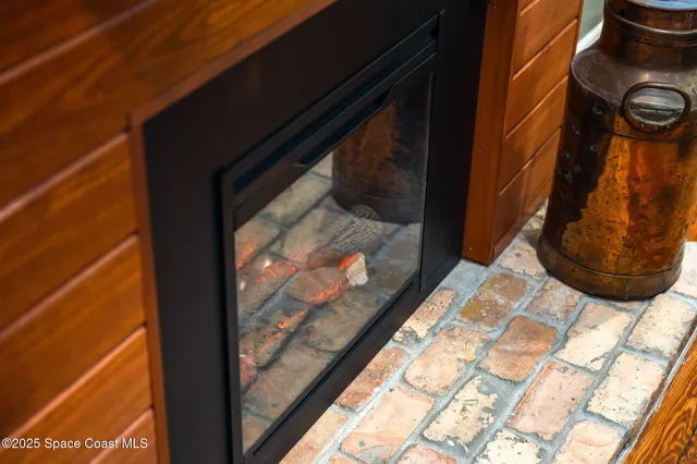 a bed room with a bed and a television