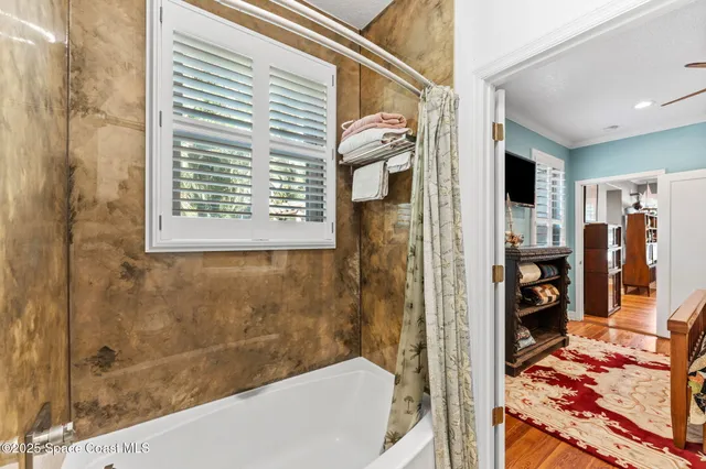 an aerial view of a house with a garden