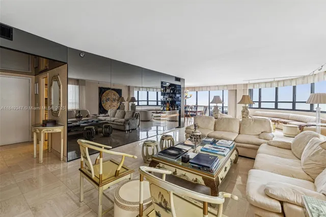 a living room with furniture and a table