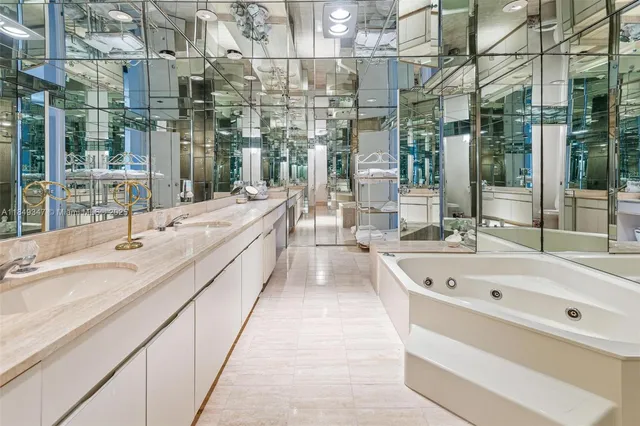 a bedroom with a bed and a television