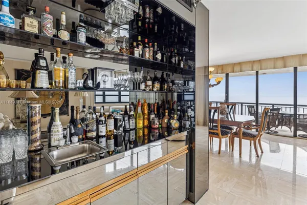 a view of a chairs and table in a room