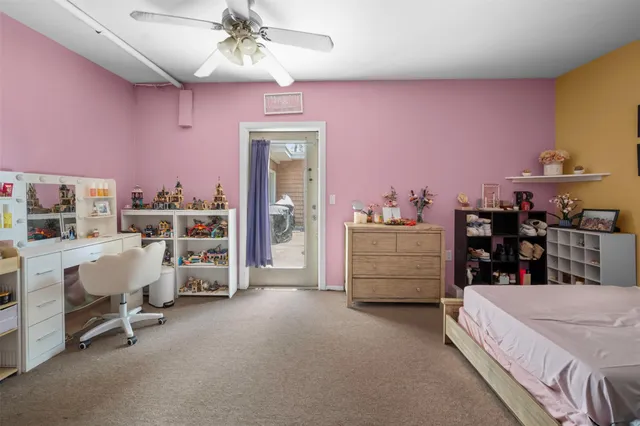 a bed room with a bed and a couch