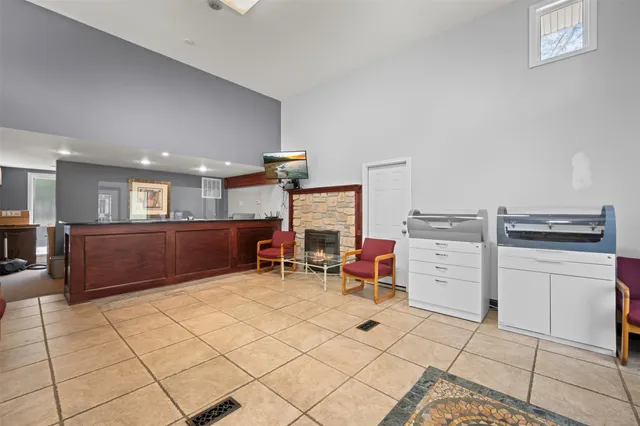 a room with furniture a desk and chair