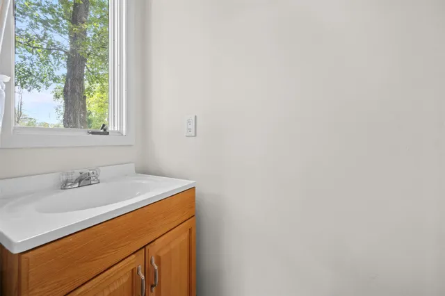 a bathroom with a sink and a vanity
