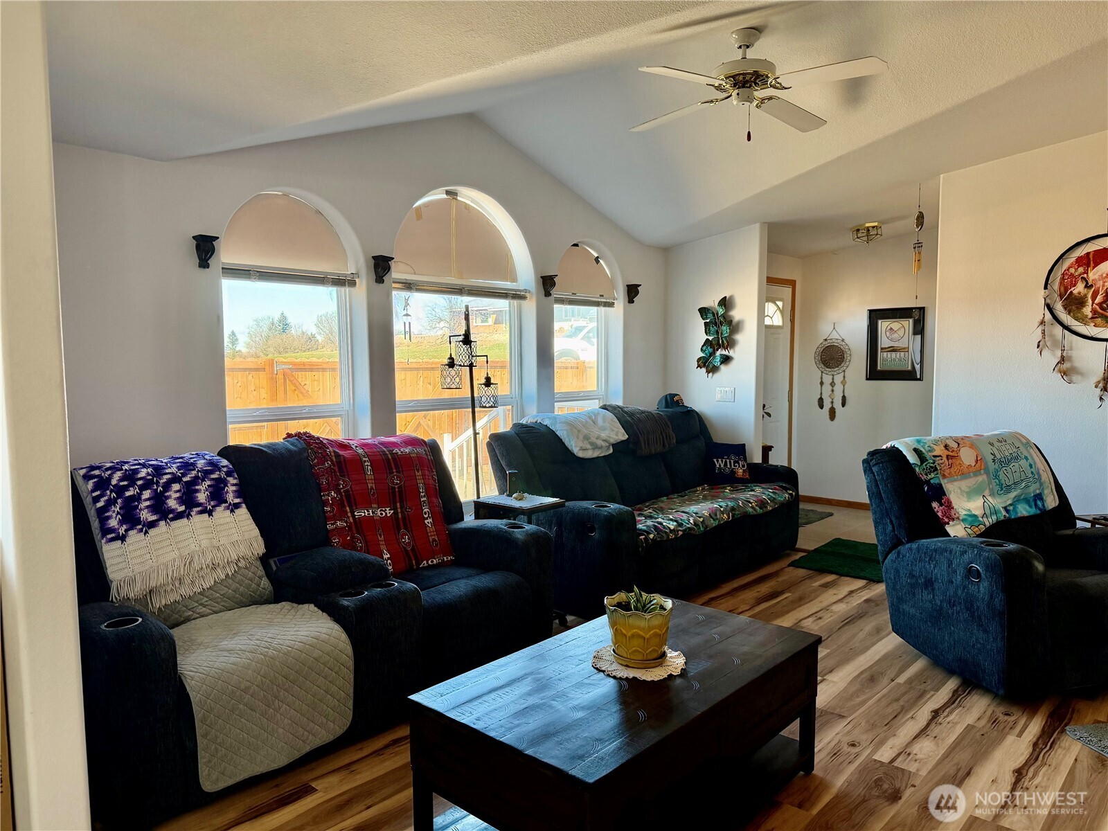 505 Northwest Portland Street Wilbur, WA 99185 - Photo 11 of 40 a living room with furniture and wooden floor