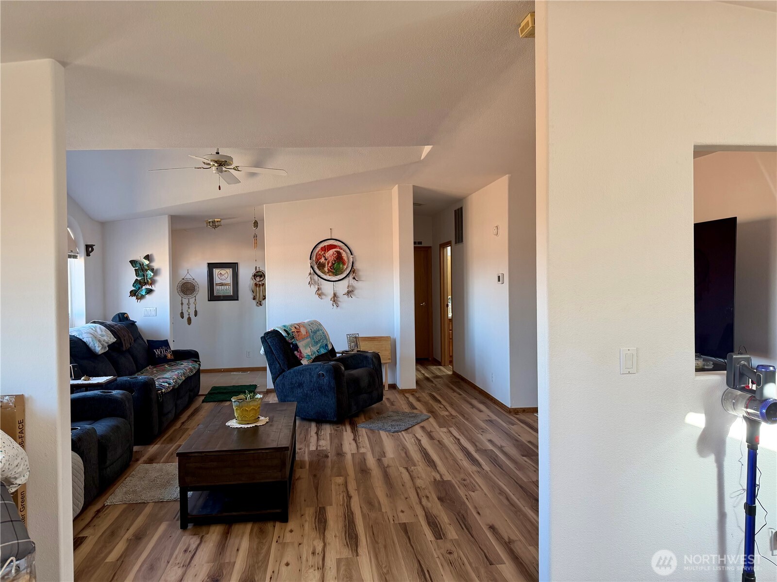 505 Northwest Portland Street Wilbur, WA 99185 - Photo 12 of 40 a living room with furniture and a flat screen tv