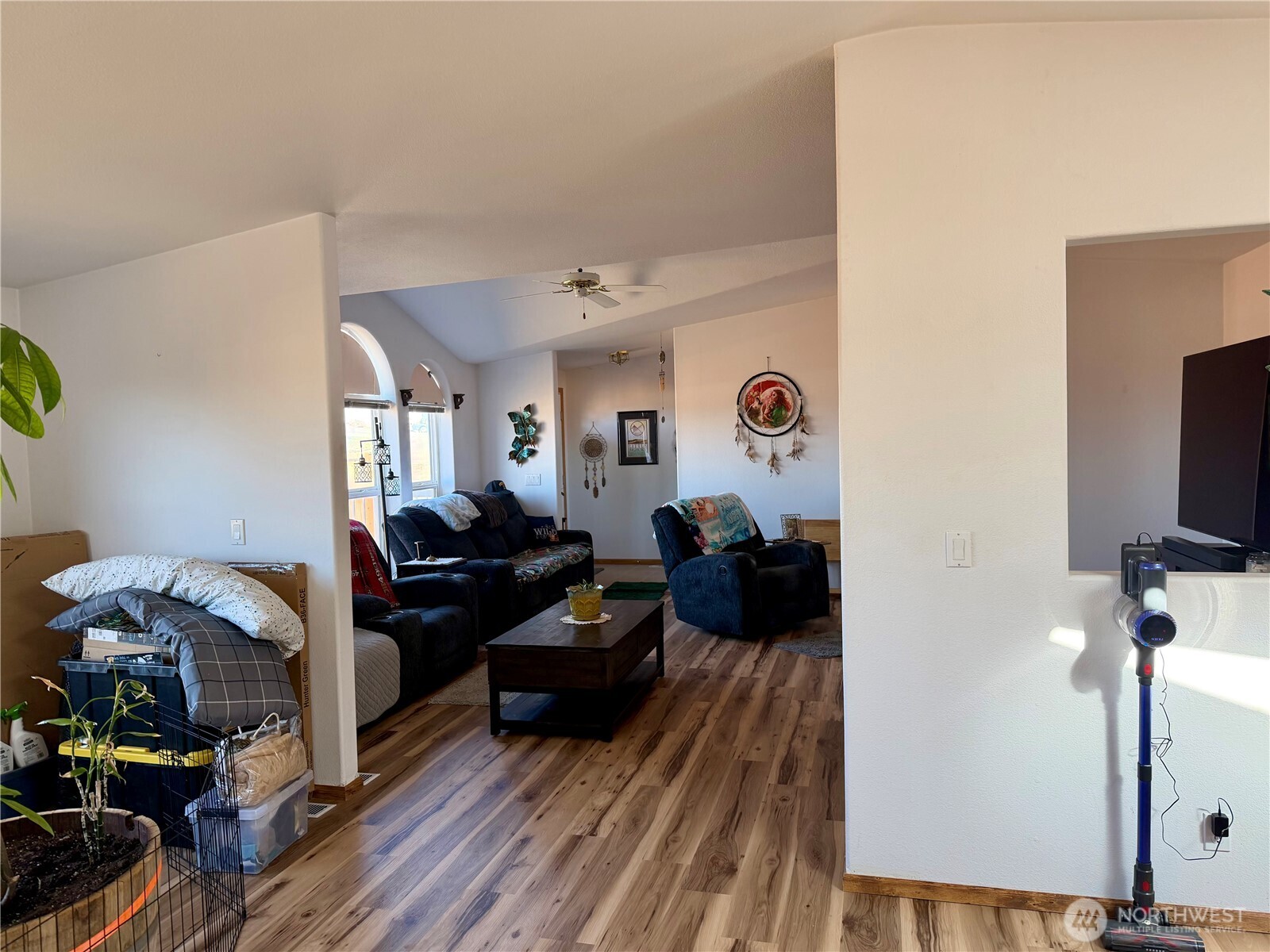505 Northwest Portland Street Wilbur, WA 99185 - Photo 13 of 40 a living room with furniture and a flat screen tv
