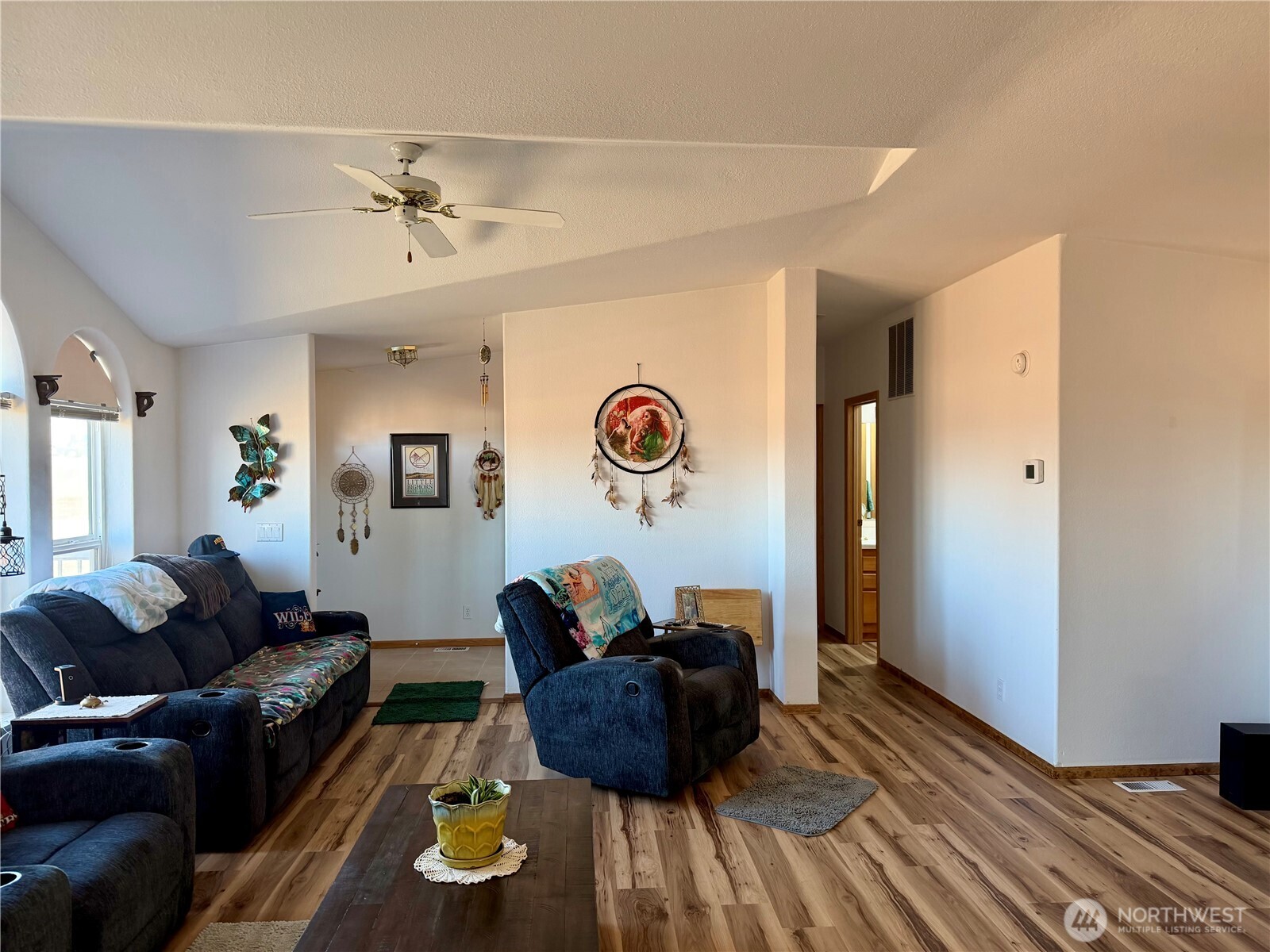 505 Northwest Portland Street Wilbur, WA 99185 - Photo 15 of 40 a living room with furniture and wooden floor