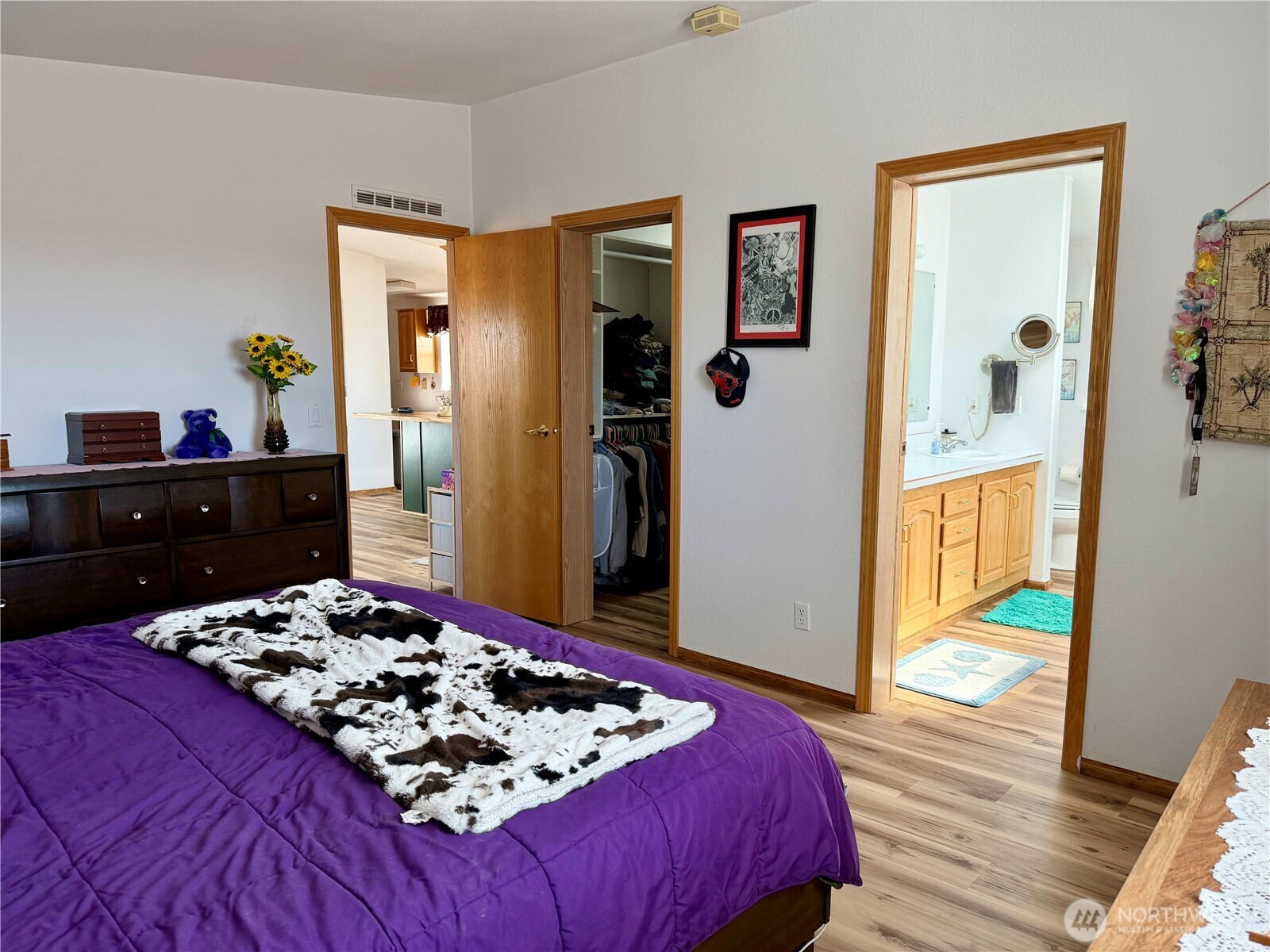 505 Northwest Portland Street Wilbur, WA 99185 - Photo 18 of 40 a bedroom with a bed and a table in it