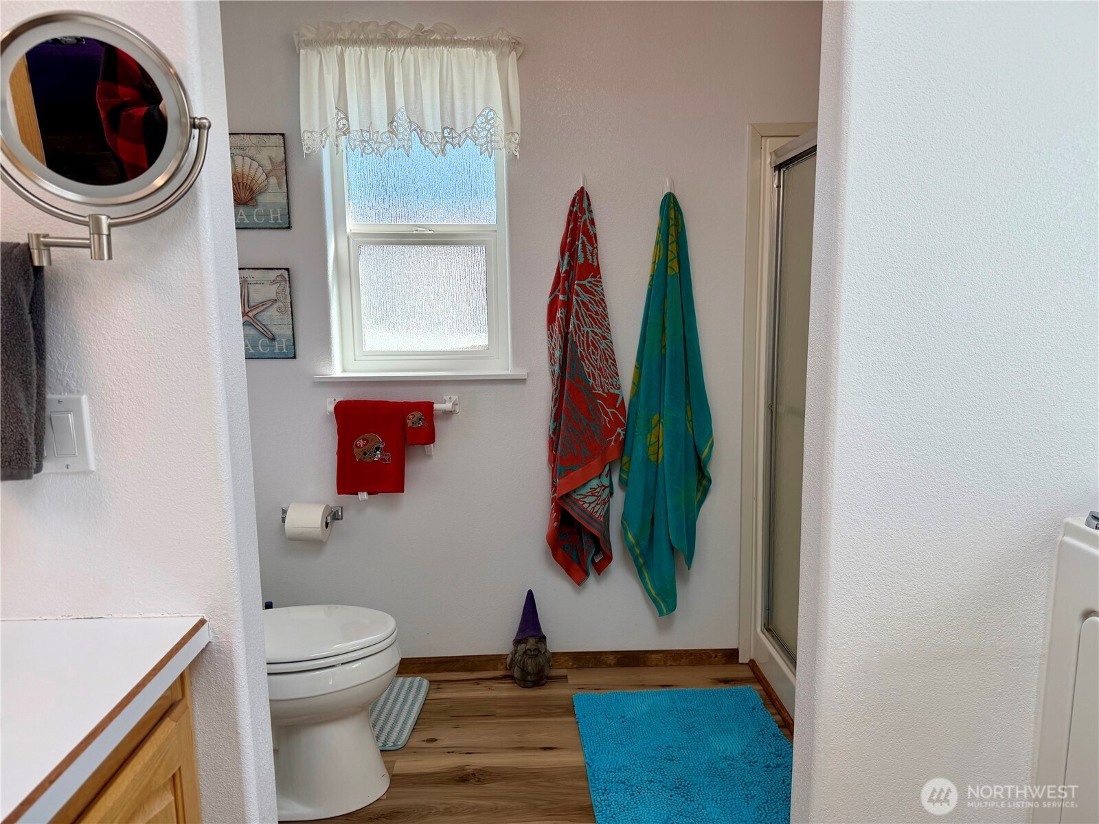505 Northwest Portland Street Wilbur, WA 99185 - Photo 20 of 40 a bathroom with a toilet and a window