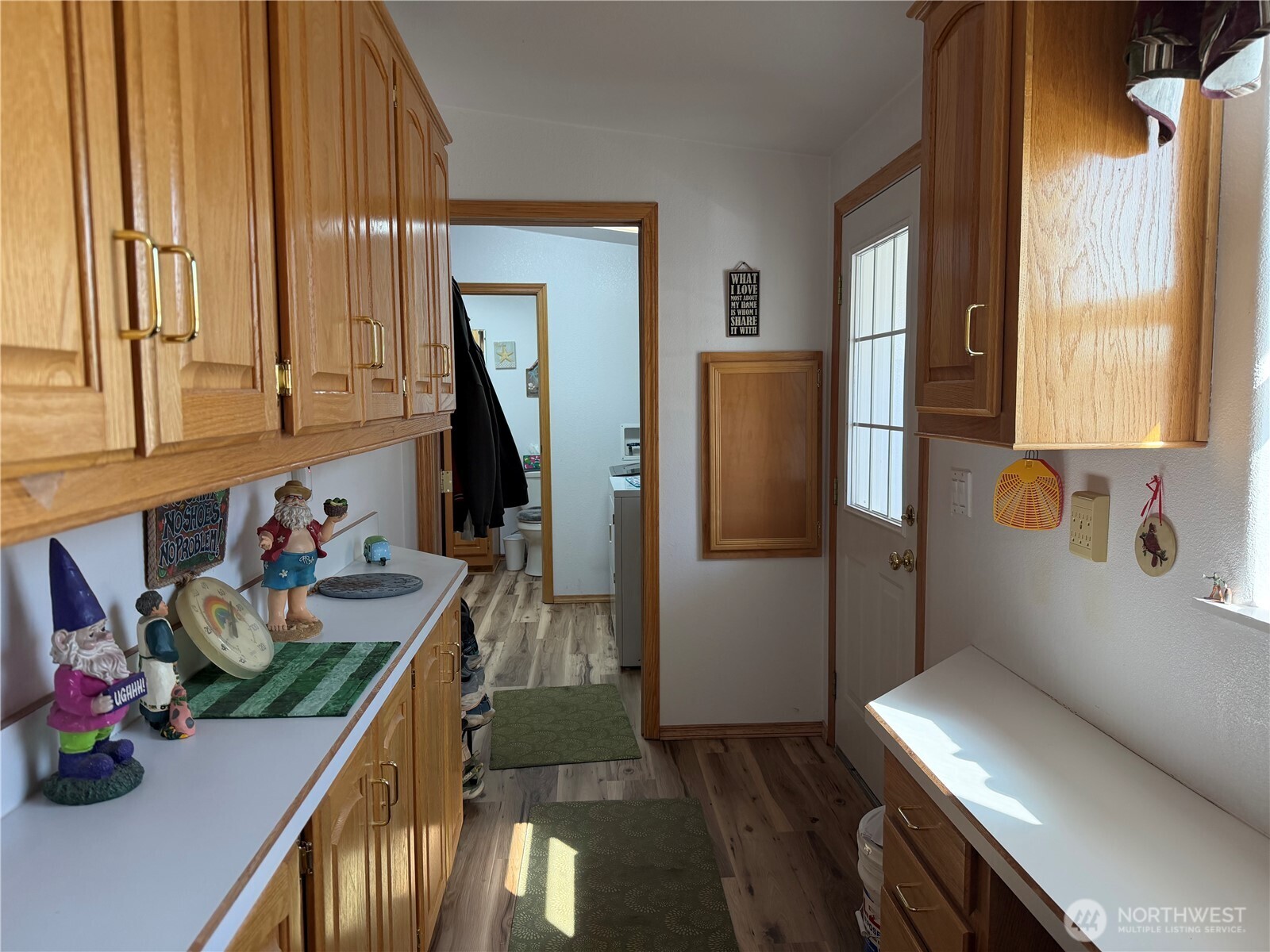 505 Northwest Portland Street Wilbur, WA 99185 - Photo 23 of 40 a view of a kitchen with furniture and a window