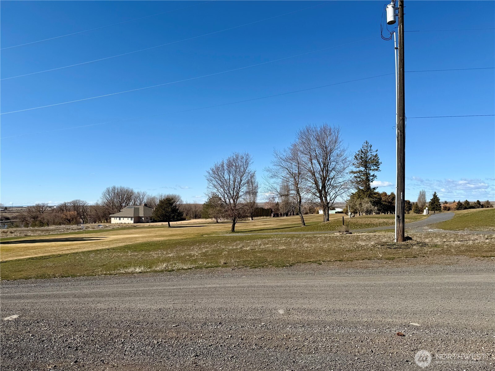 505 Northwest Portland Street Wilbur, WA 99185 - Photo 34 of 40 a view of a lake with a big yard