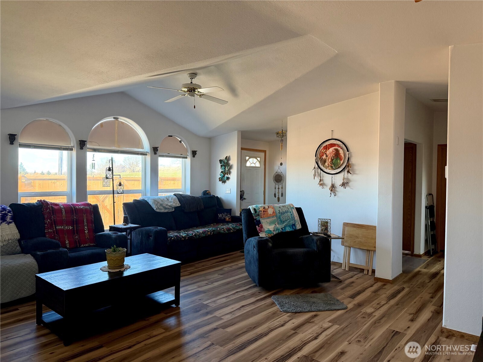 505 Northwest Portland Street Wilbur, WA 99185 - Photo 10 of 40 a living room with furniture and a large window